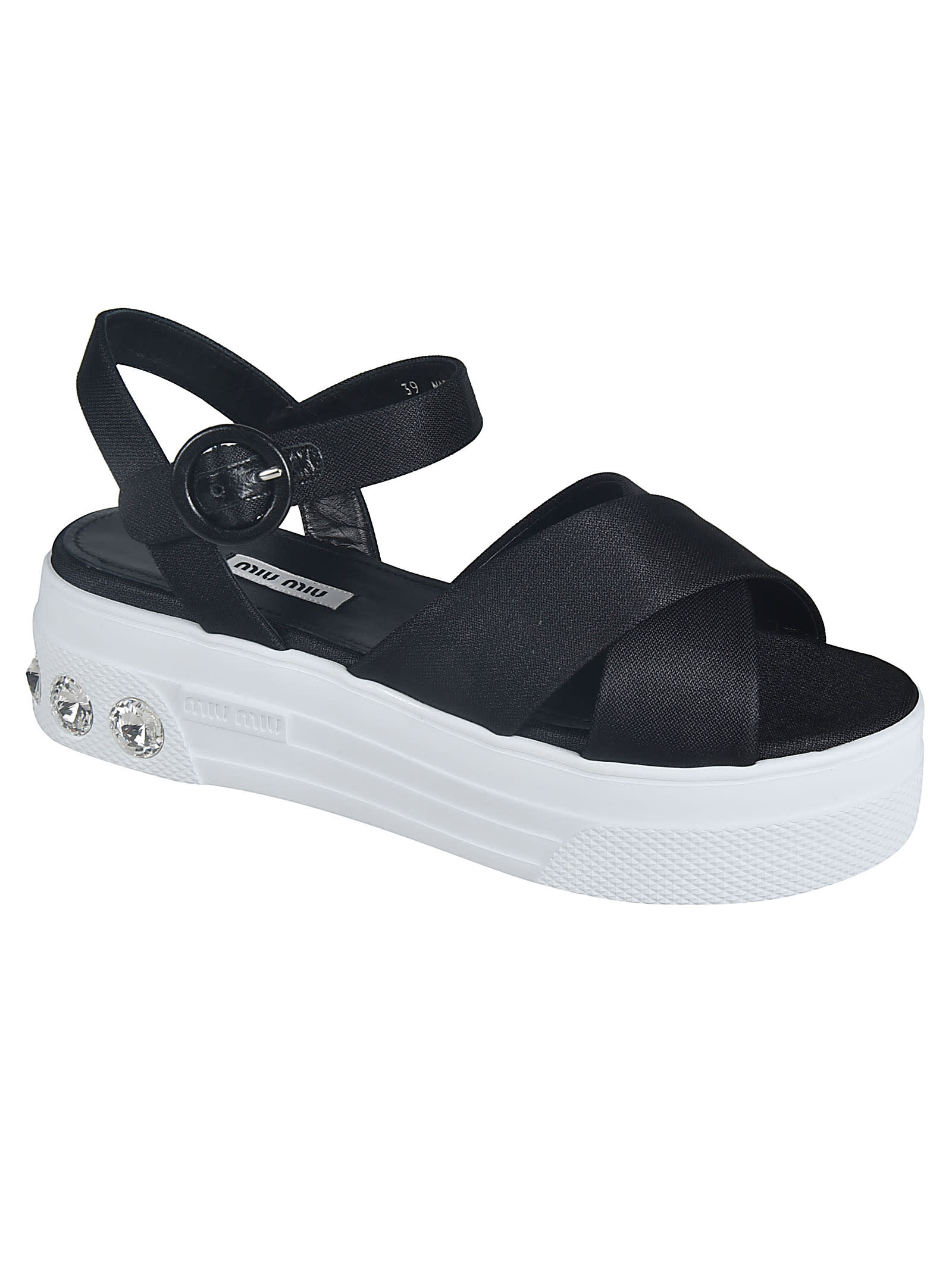 Shop Miu Miu Cross-strap Sandals In Black