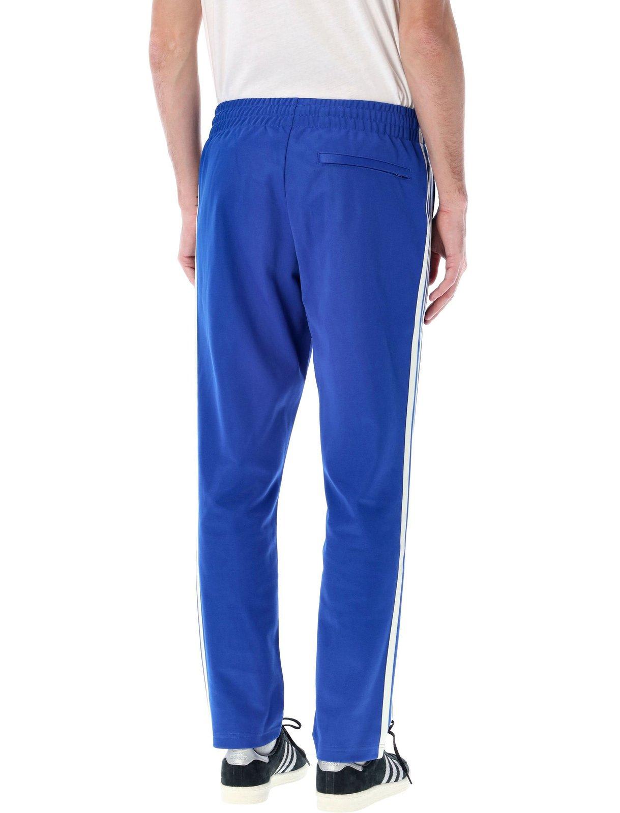 Shop Adidas Originals Straight Leg Track Trousers In Gnawed Blue