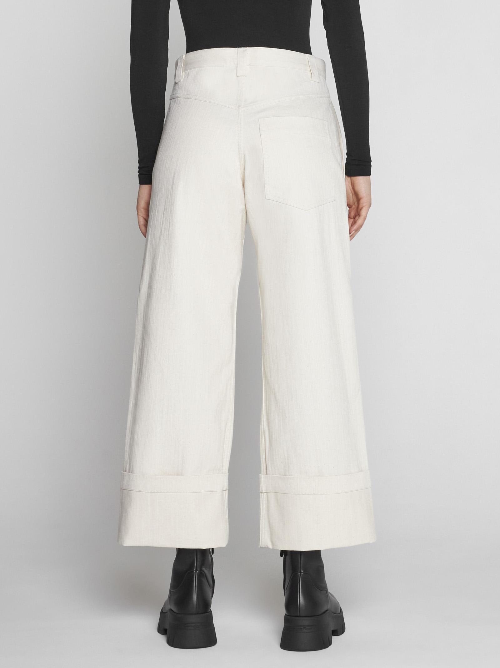 Shop Moncler Genius Flared Cropped Jeans In White