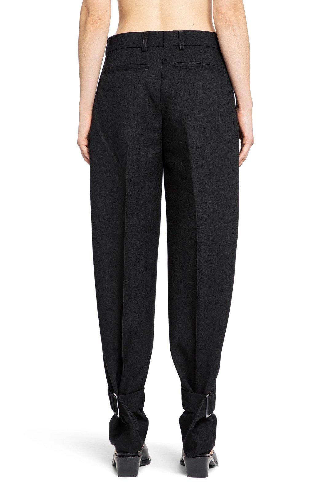 Shop Totême Pressed Crease Tapered-leg Trousers In 001 Black