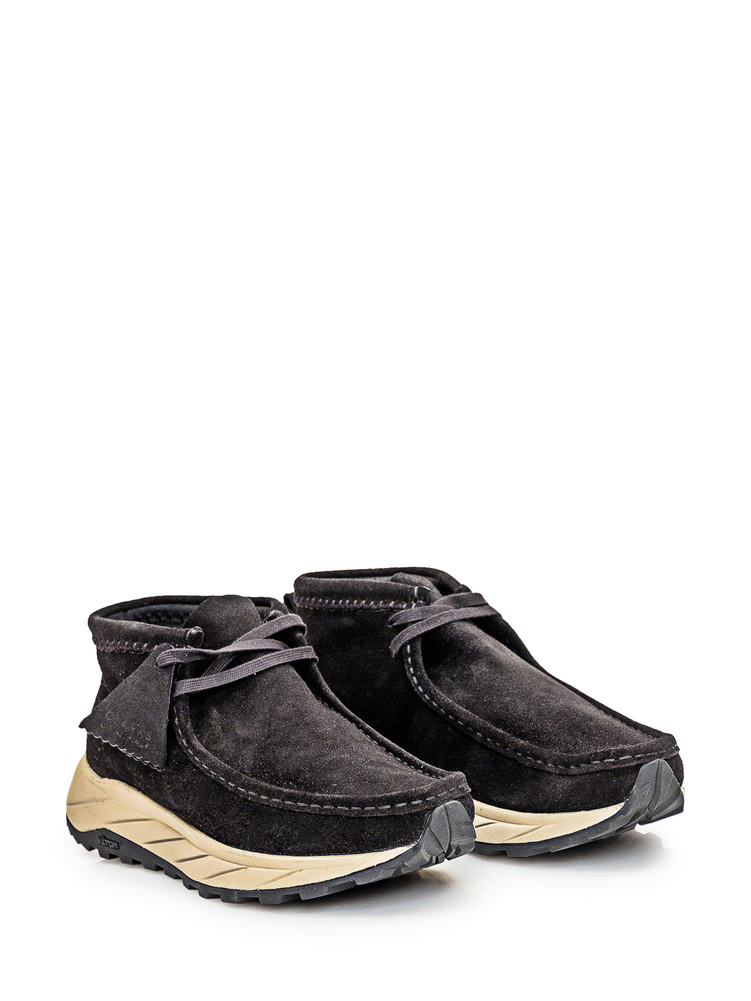 Shop Clarks Wallabee Boots In Black