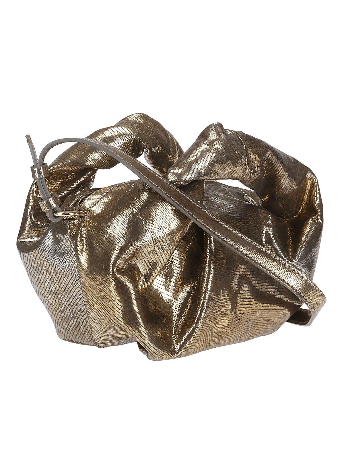 Shop Dries Van Noten Metallic Effect Zip-up Clutch Bag In Golden