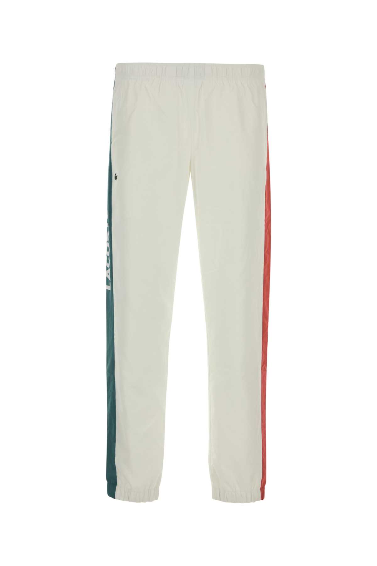 Lacoste Joggers With Printed Logo And Side Stripes In Isb