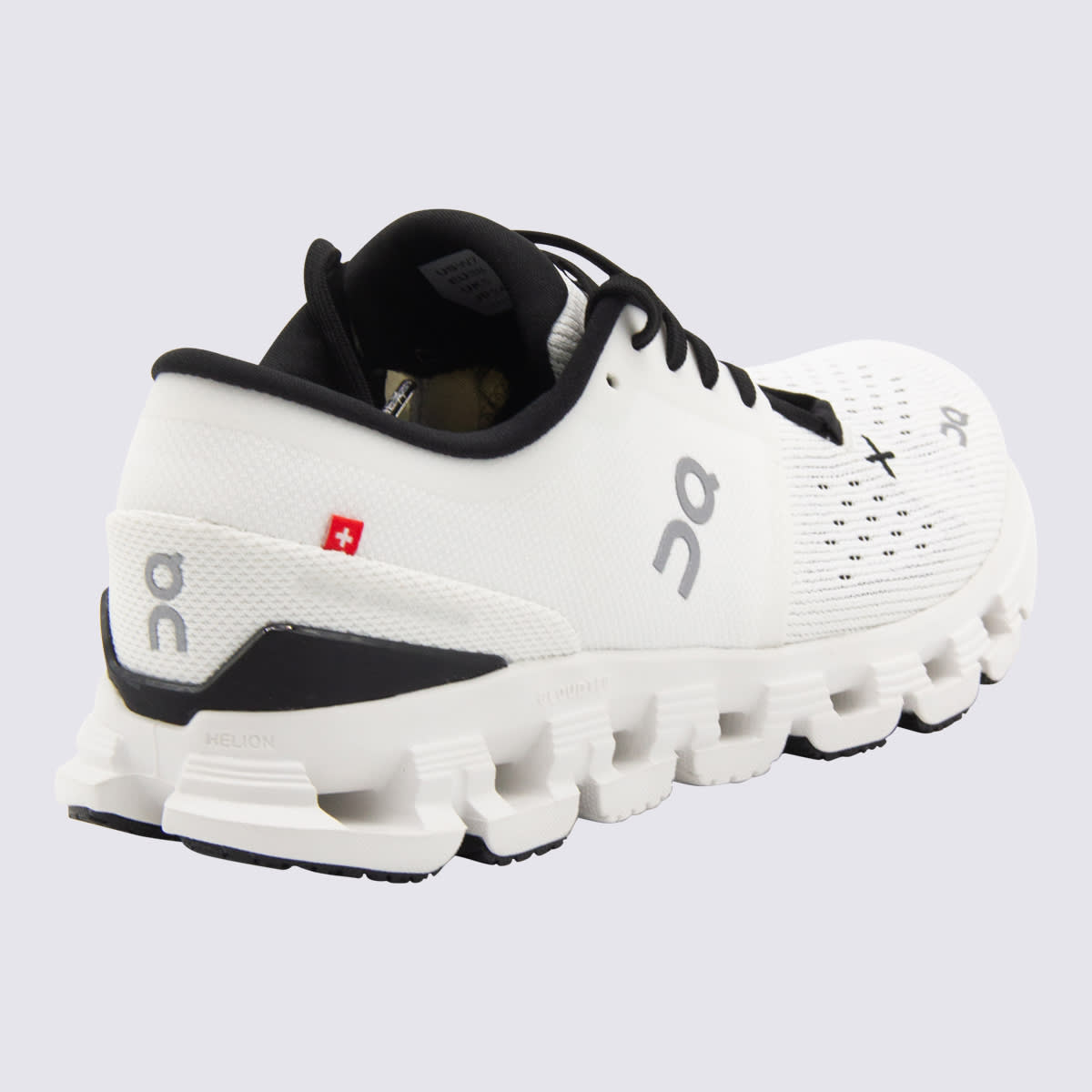 On Ivory And Black Cloud Sneakers In White