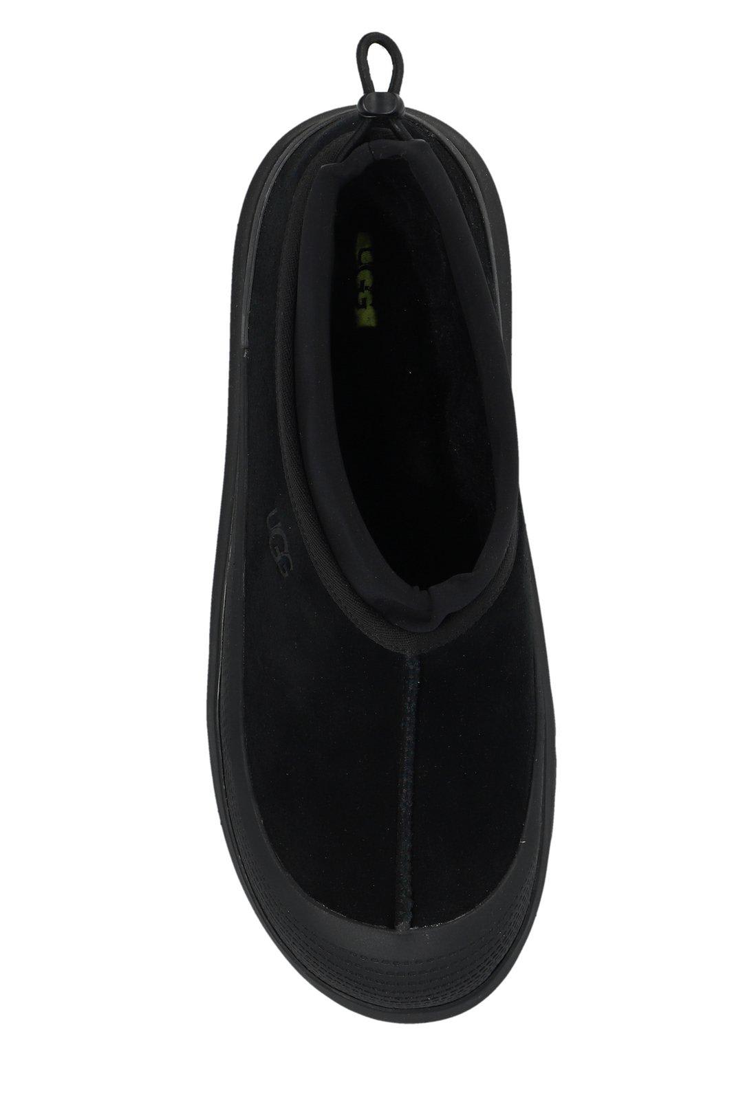 Shop Ugg Tasman Weather Hybrid Slip-on Slippers In Bblc Black / Black