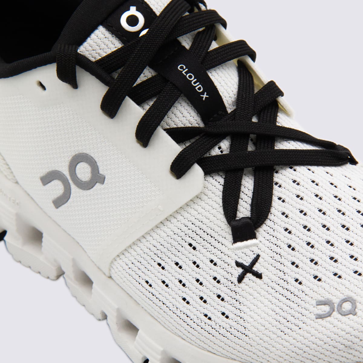 On Ivory And Black Cloud Sneakers In White