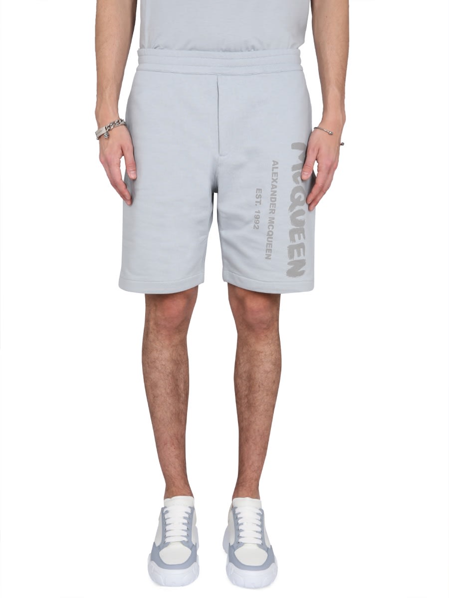 Alexander Mcqueen Men Bermuda Shorts With Graffiti Logo Print In Azure