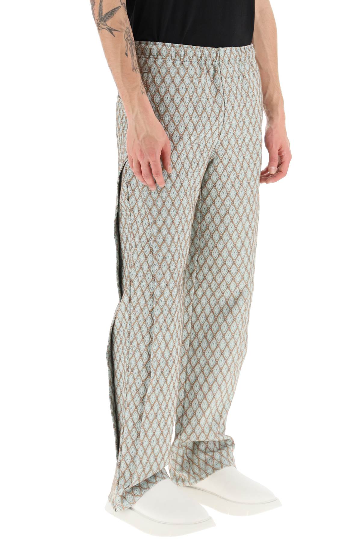 Shop Andersson Bell Geometric Jacquard Pants With Side Opening In Beige (beige)