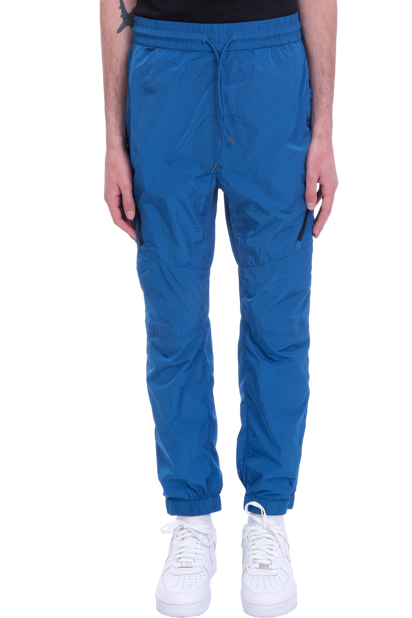 C.p. Company Track pants PANTS IN BLUE SYNTHETIC FIBERS