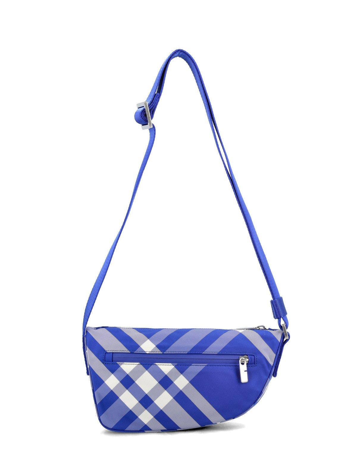 Shop Burberry Shield Check-pattern Zipped Messenger Bag In Knight