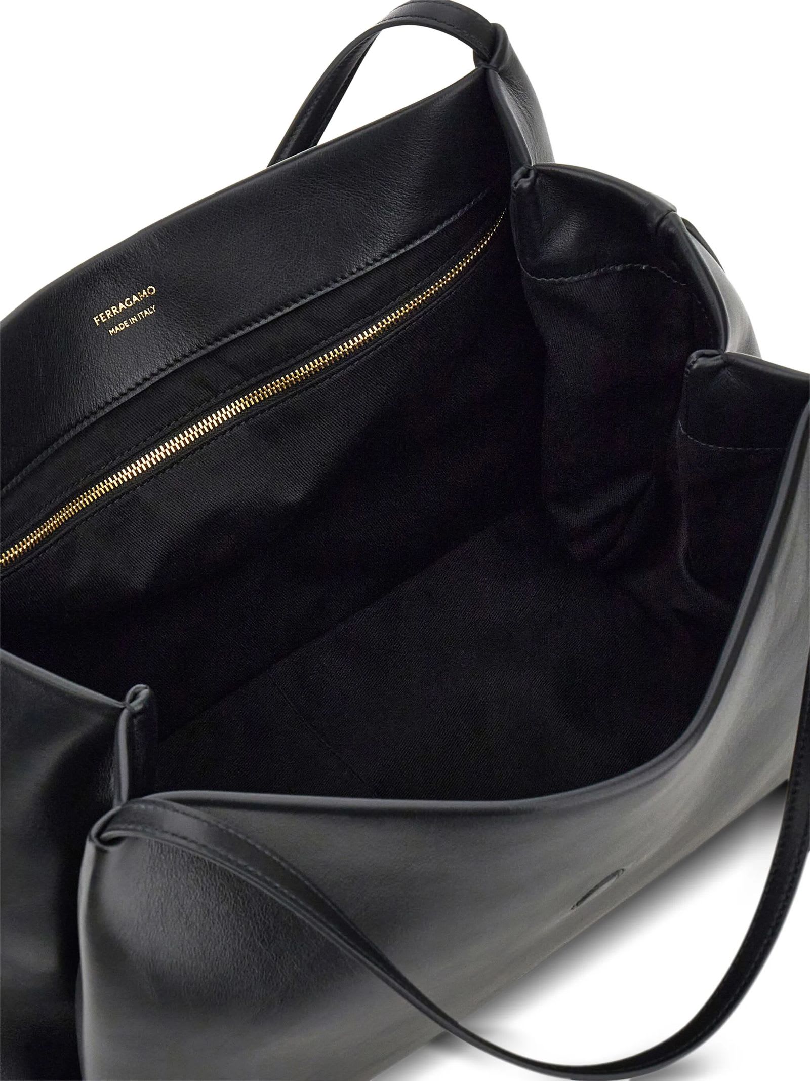 Ferragamo Buckle Strap Soft Structure Shoulder Bag In Black