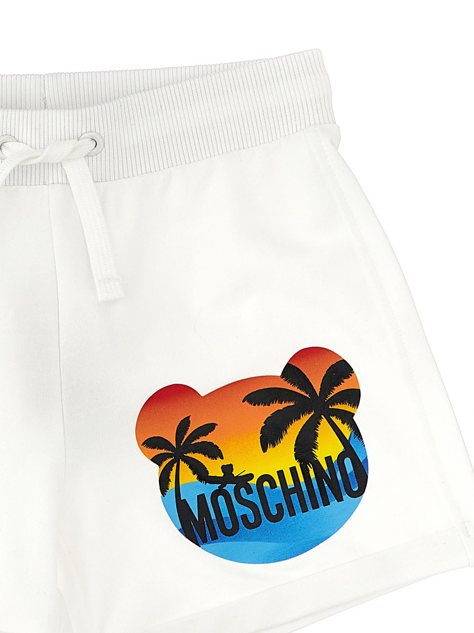 Shop Moschino Logo Print Shorts In White