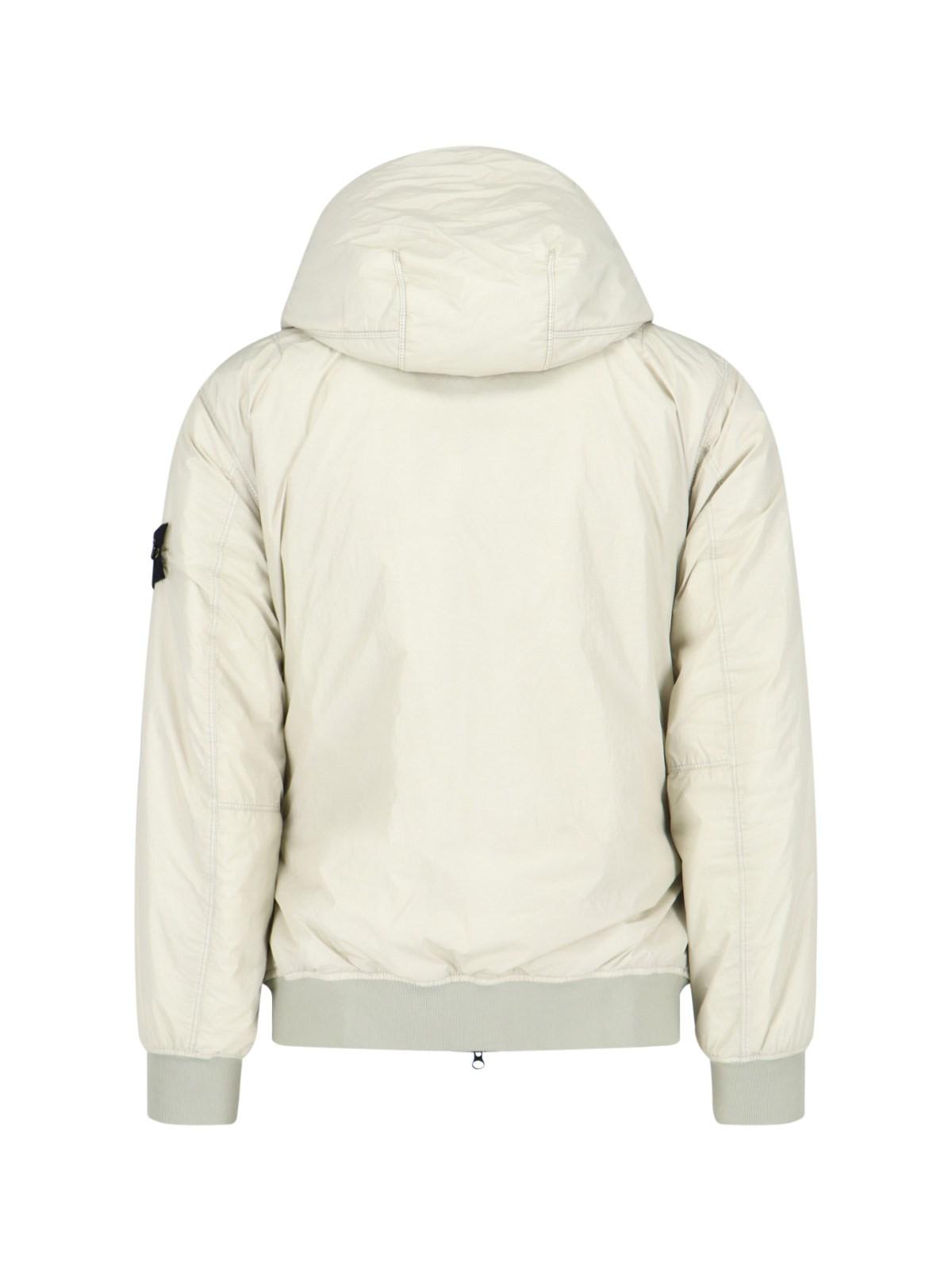 Shop Stone Island Logo Patched Rib Hem Zipped Windbreaker In Plaster