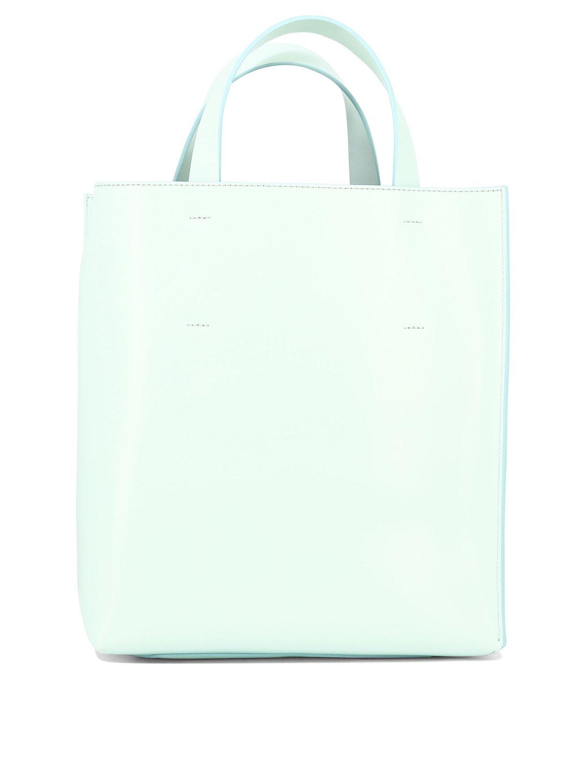 Shop Marni Logo Printed Drawstring Tote Bag In Blue