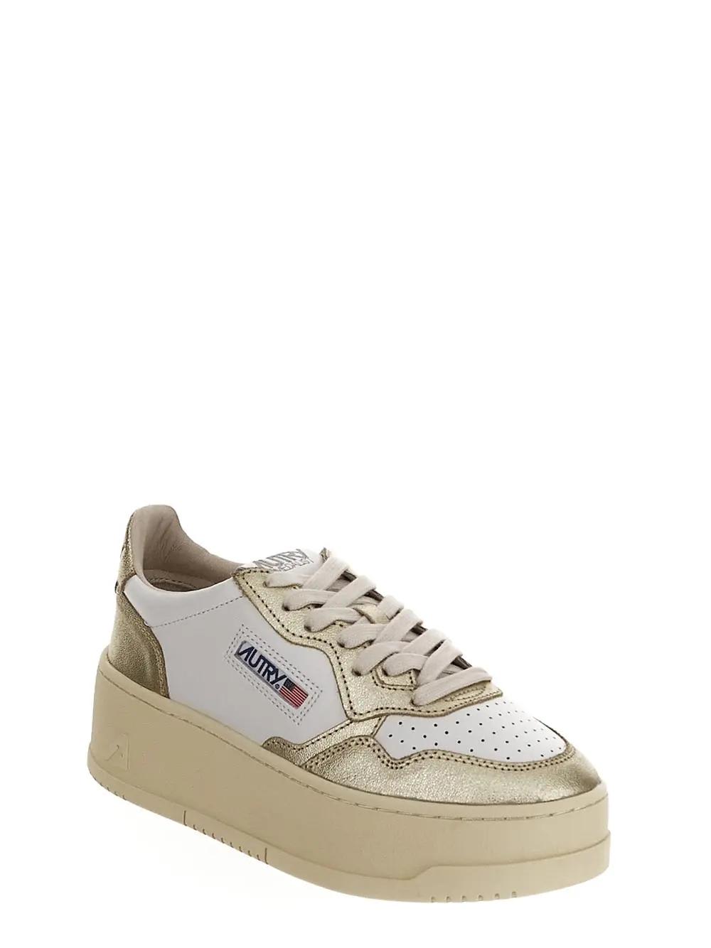 Shop Autry Platform Low Sneakers In Golden