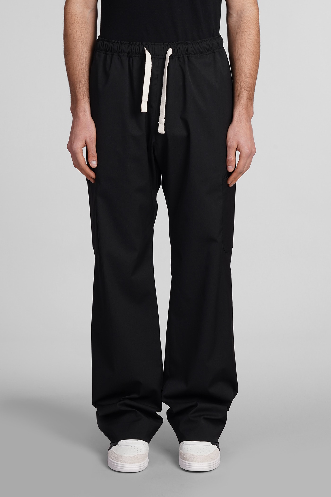 PALM ANGELS PANTS IN BLACK POLYESTER