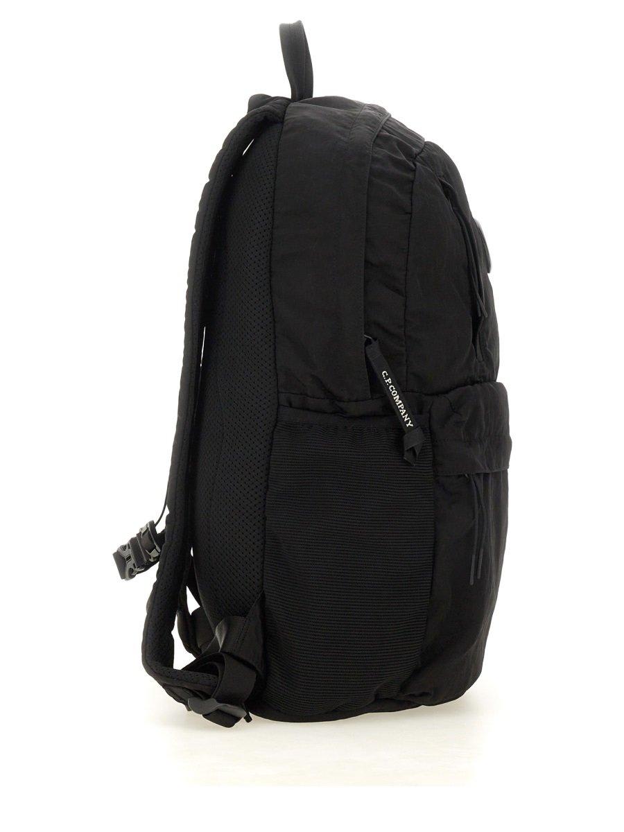 Shop C.p. Company Lens Detailed Logo Patch Backpack In Nero