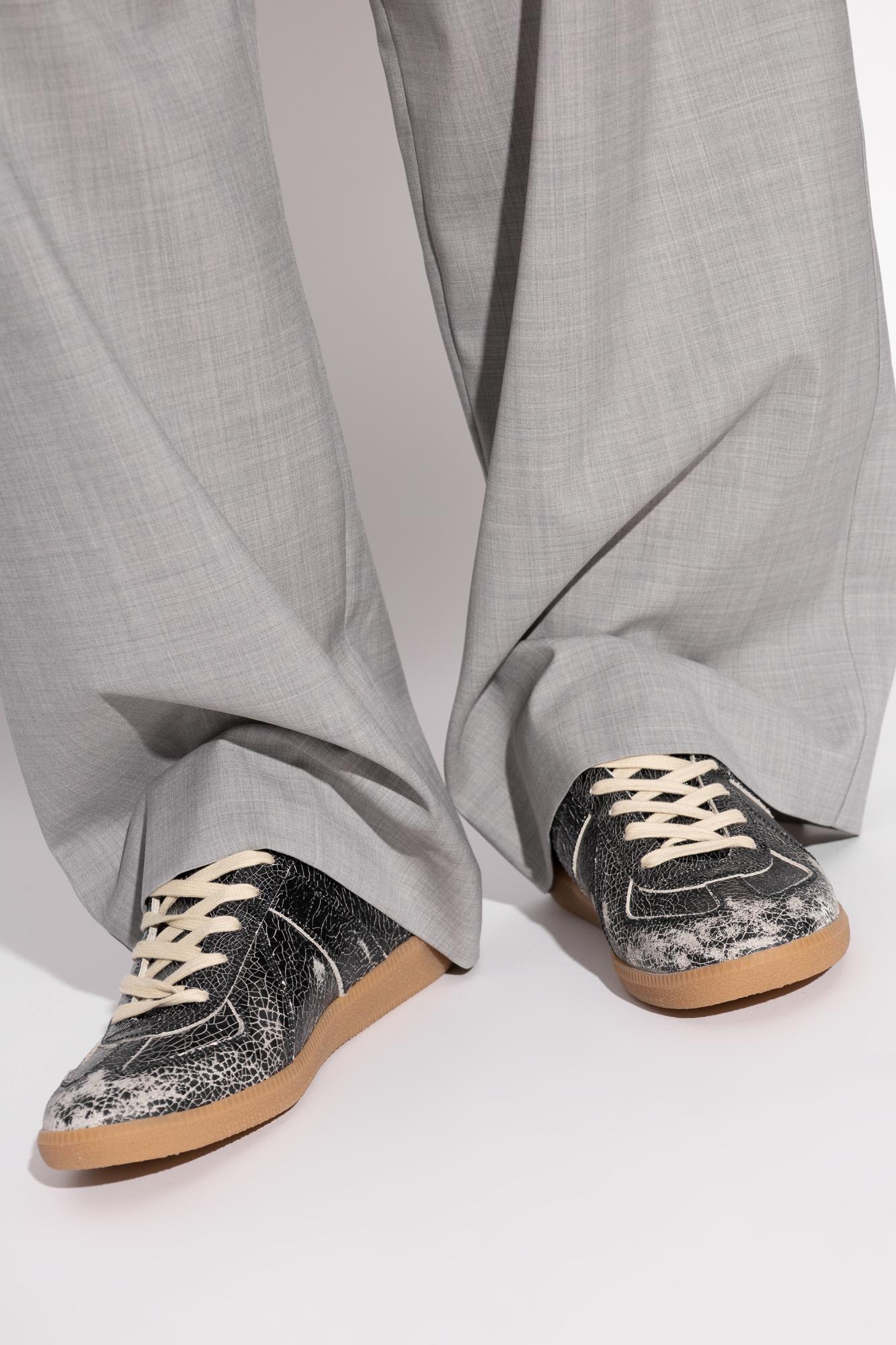 Maison Margiela Replica Sneakers Made Of Shiny Coated Leather In Black
