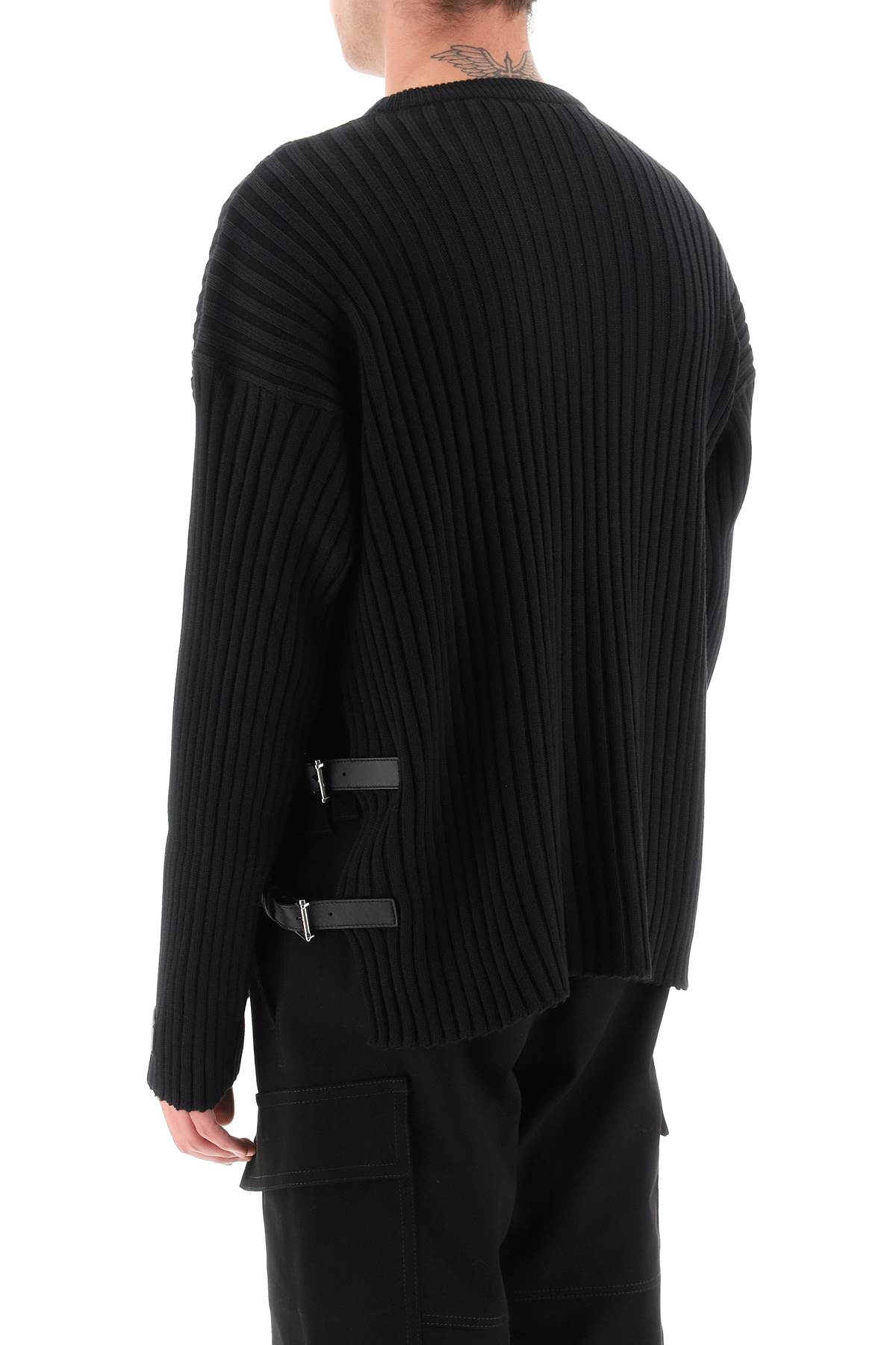 Shop Versace Ribbed-knit Sweater With Leather Straps In Black (black)