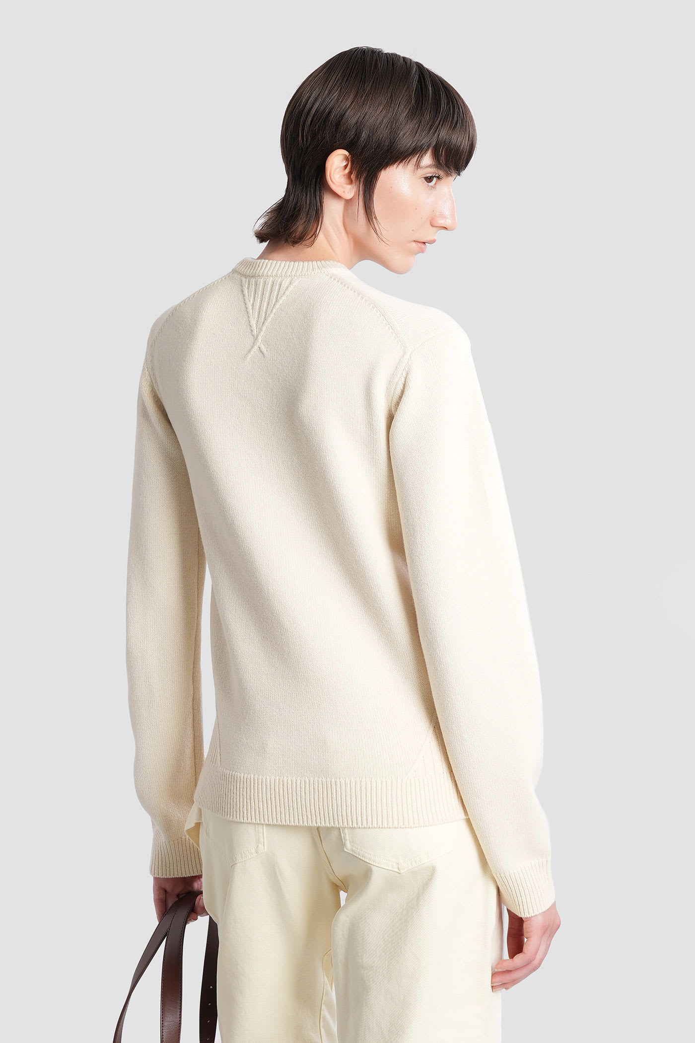 Jw Anderson Knitwear In Beige Wool In Neutral