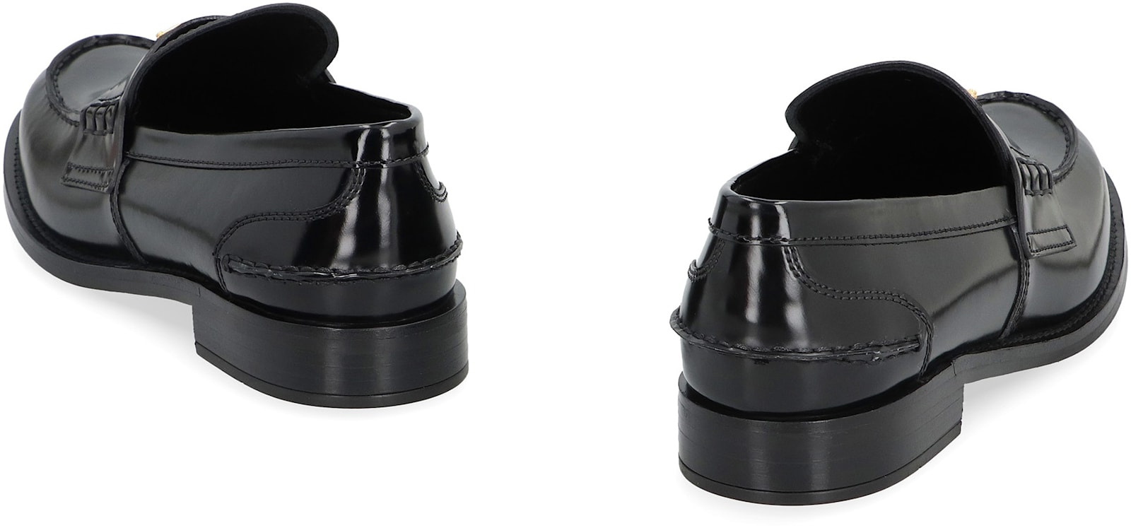 Prada Leather Loafers With Decorative Buckle And Round Toe In Black