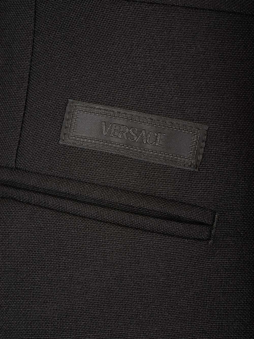 Shop Versace Tailored Trousers In Black