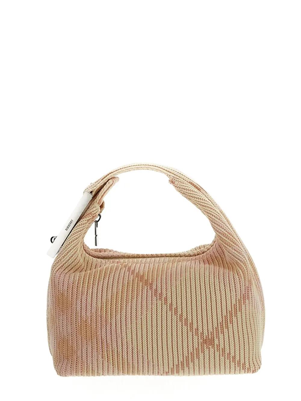 Shop Burberry Mini Peg Duffle Bag In Pink