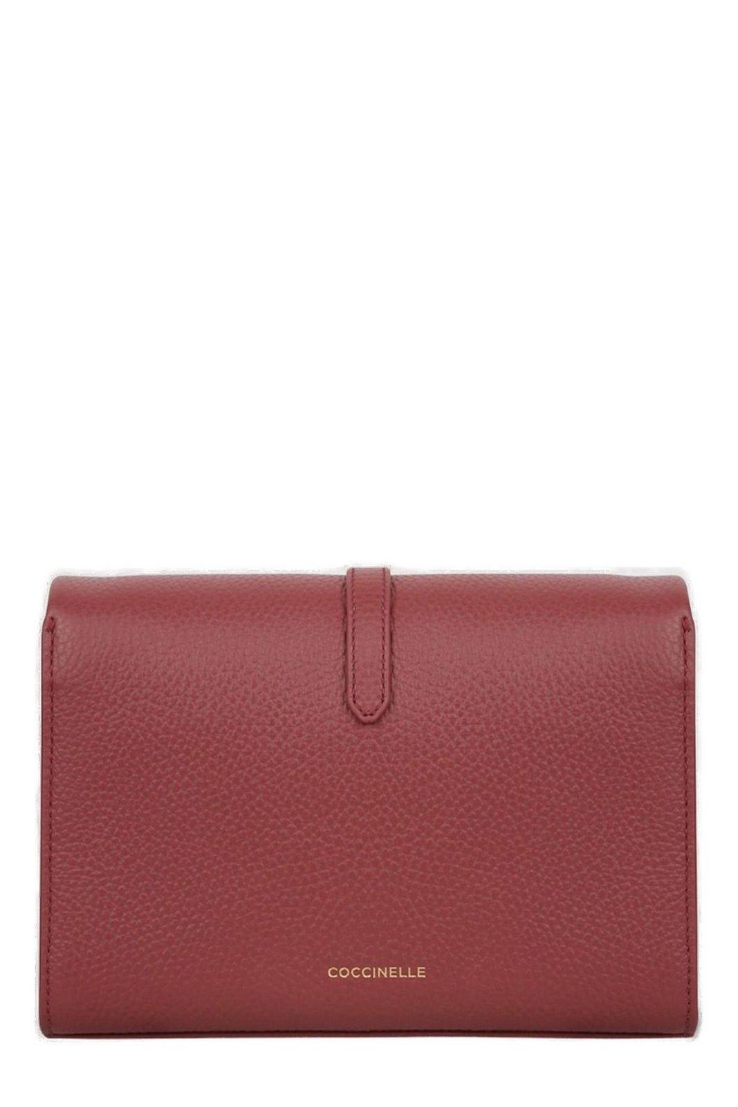 Shop Coccinelle Dorian Logo Stamp Crossbody Bag In Brandy