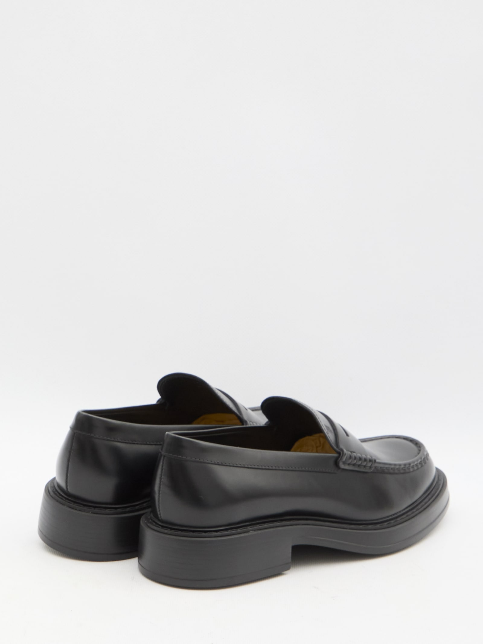 Shop Tod's Leather Loafers In Black