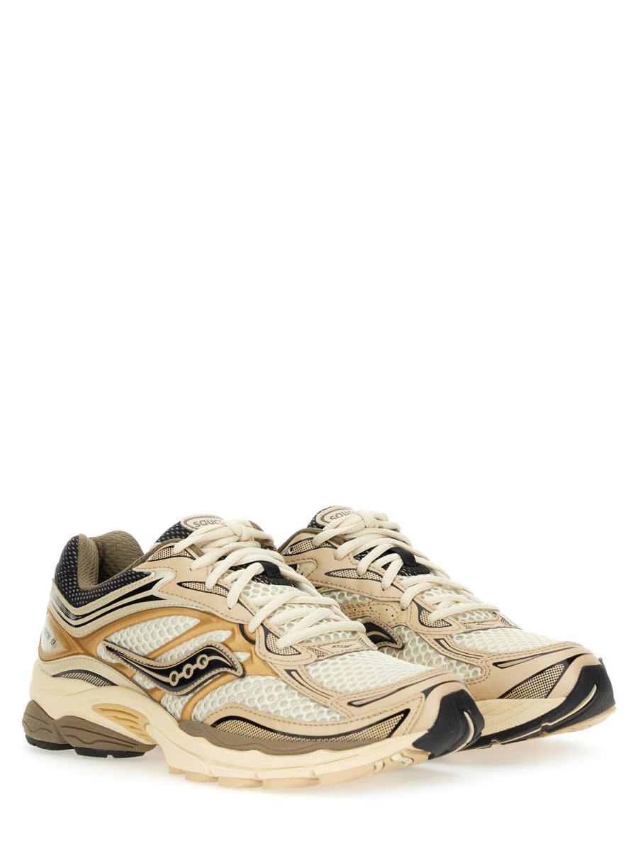 Saucony Progrid Omni 9 Running Sneakers In Gold