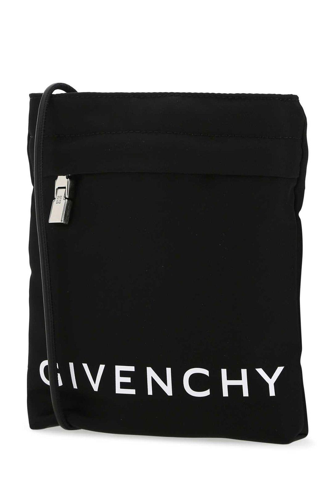 Shop Givenchy Logo Printed Iphone Pouch In Black