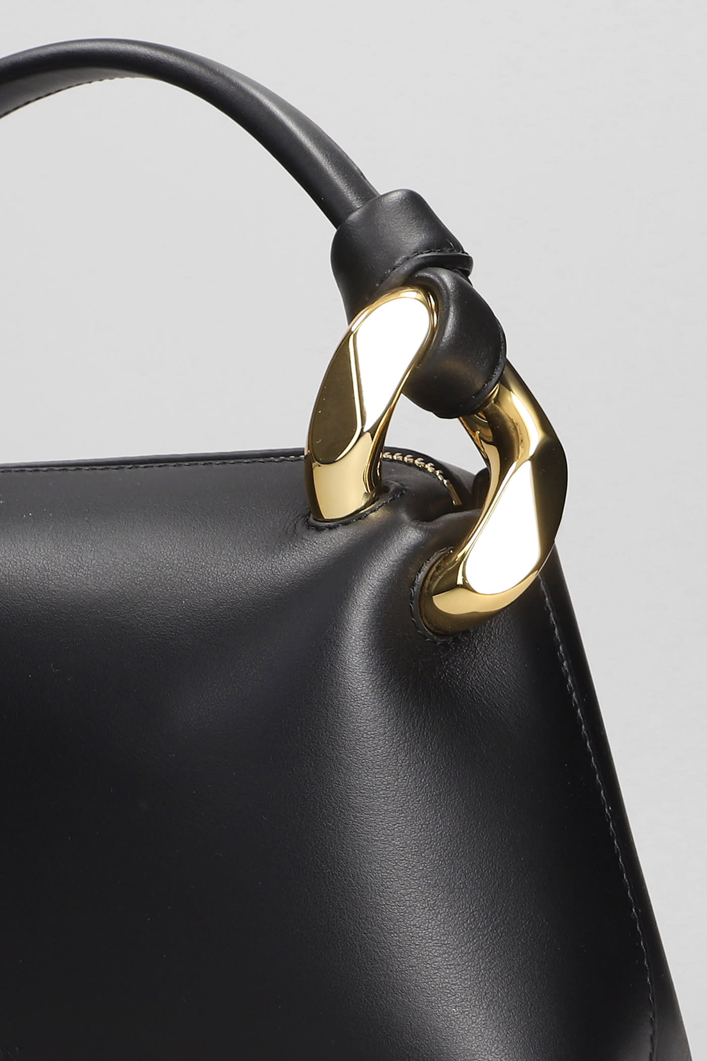 Shop Jw Anderson Corner Shoulder Bag In Black Leather