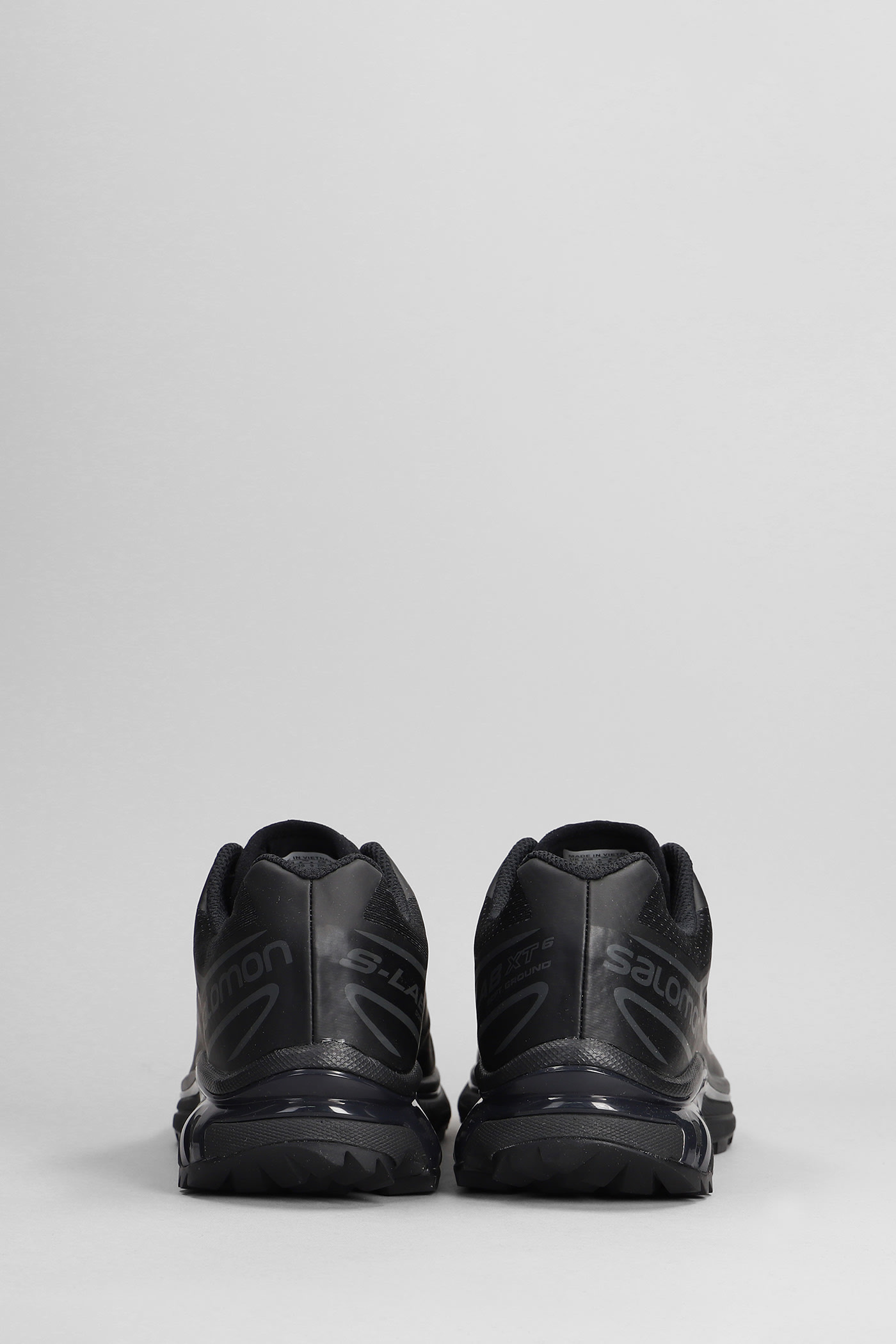 Shop Salomon Xt-6 Sneakers In Black Synthetic Fibers