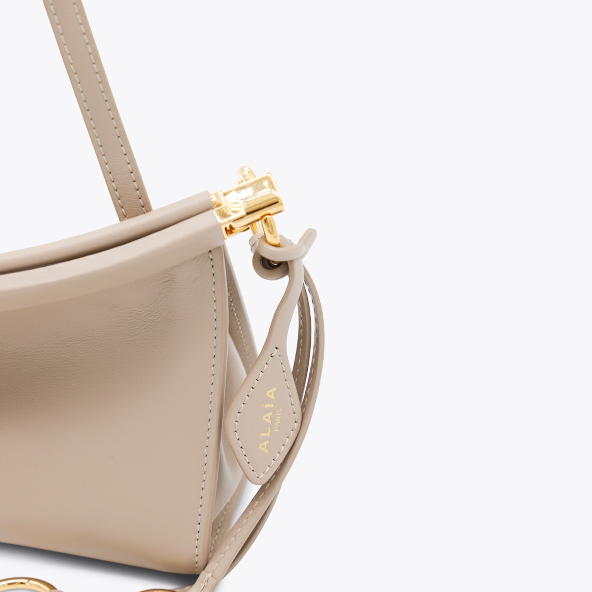 Alaïa Beige Leather Le Click East West Small Crossbody Bag In Gray