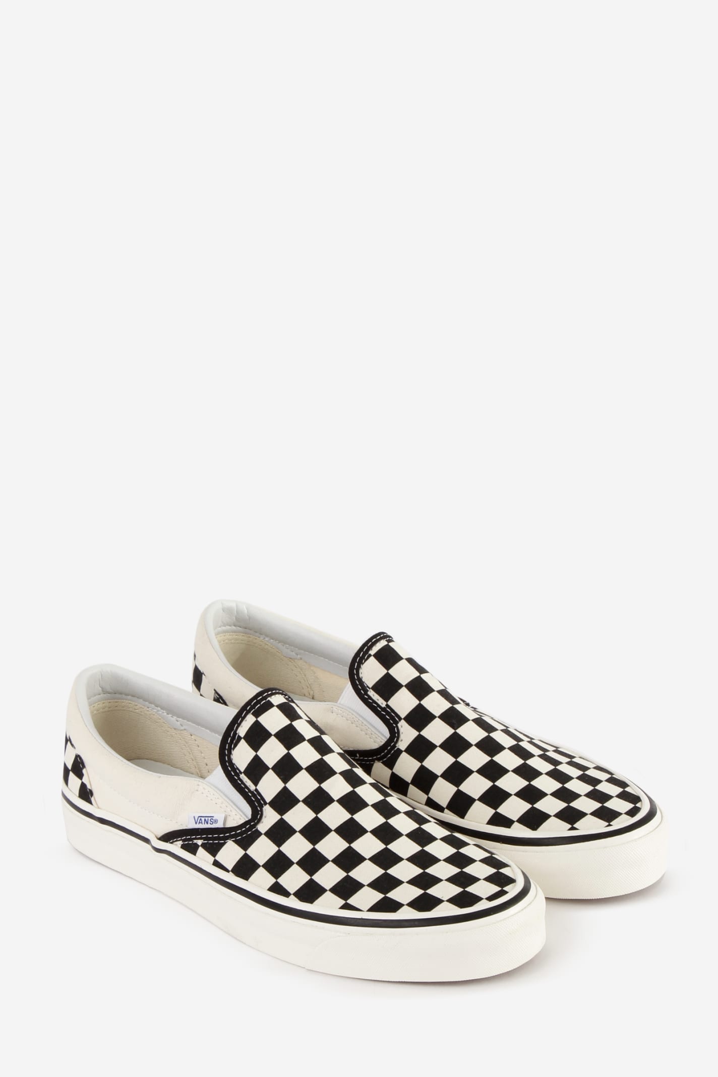Shop Vans Classic Slip-on Sneakers In Checker