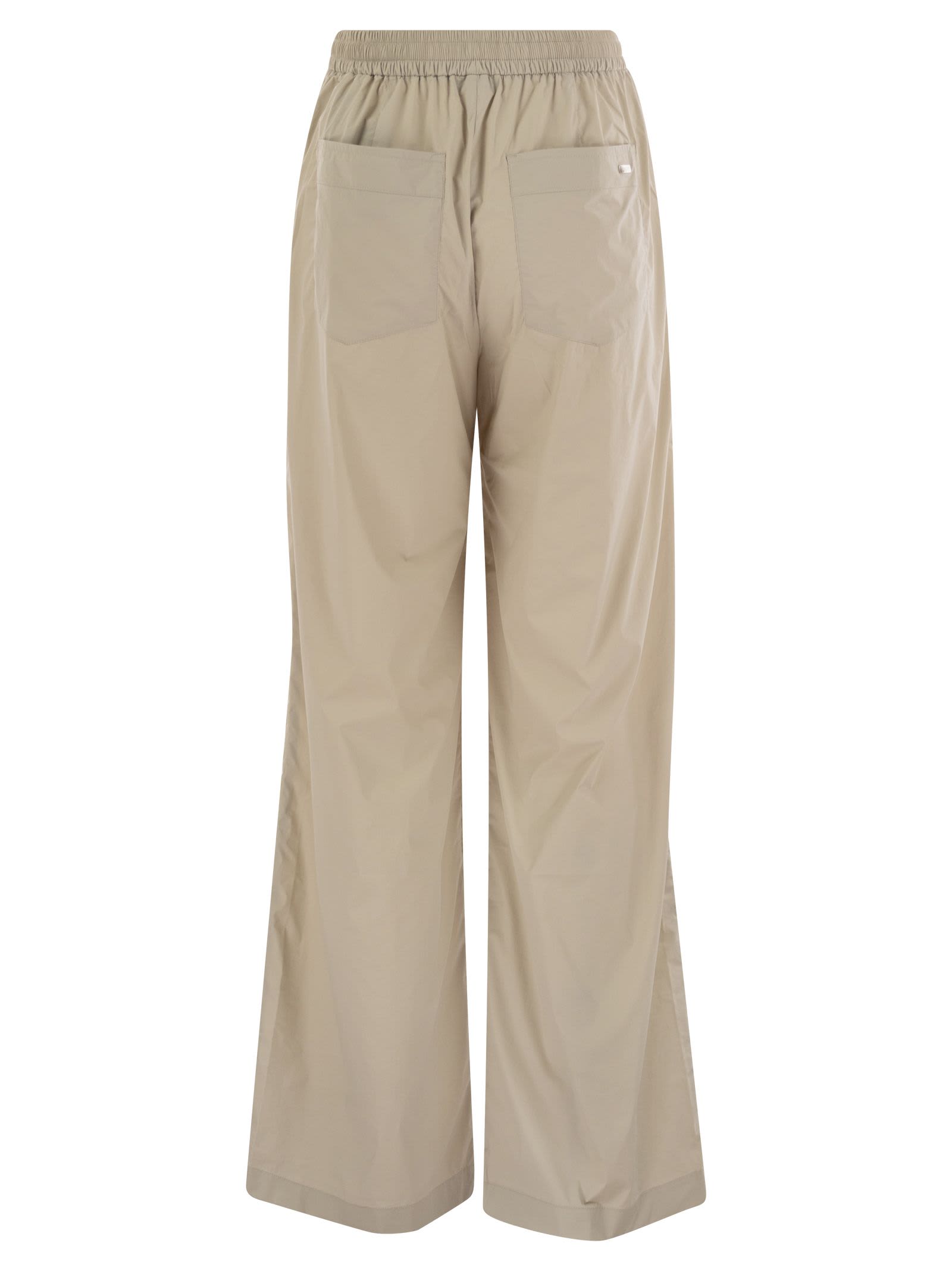 Shop Herno Stretch Nylon Trousers In Beige