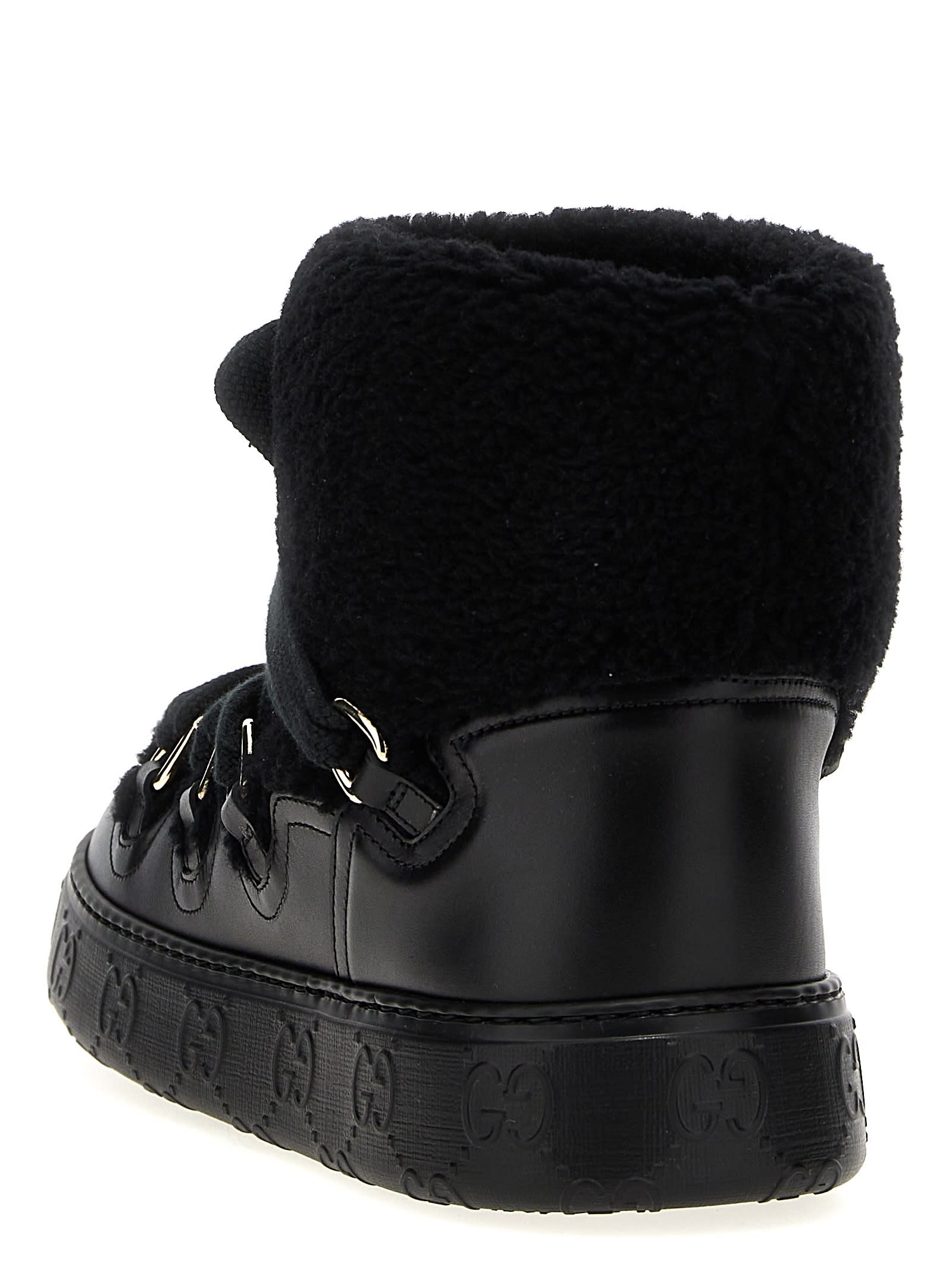 Gucci Shearling Trim Ankle Boots With Metal Eyelets In Black