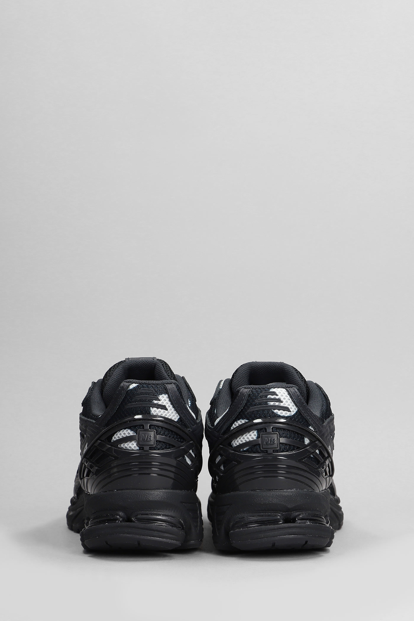 Shop New Balance 1906r Sneakers In Black Leather And Fabric