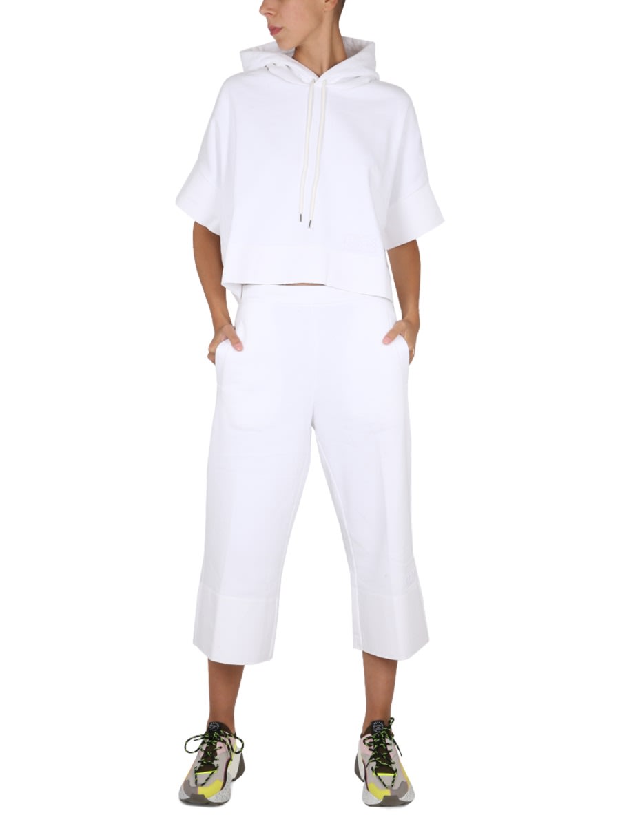 Shop Stella Mccartney Pantalone Con Ricamo Logo In White