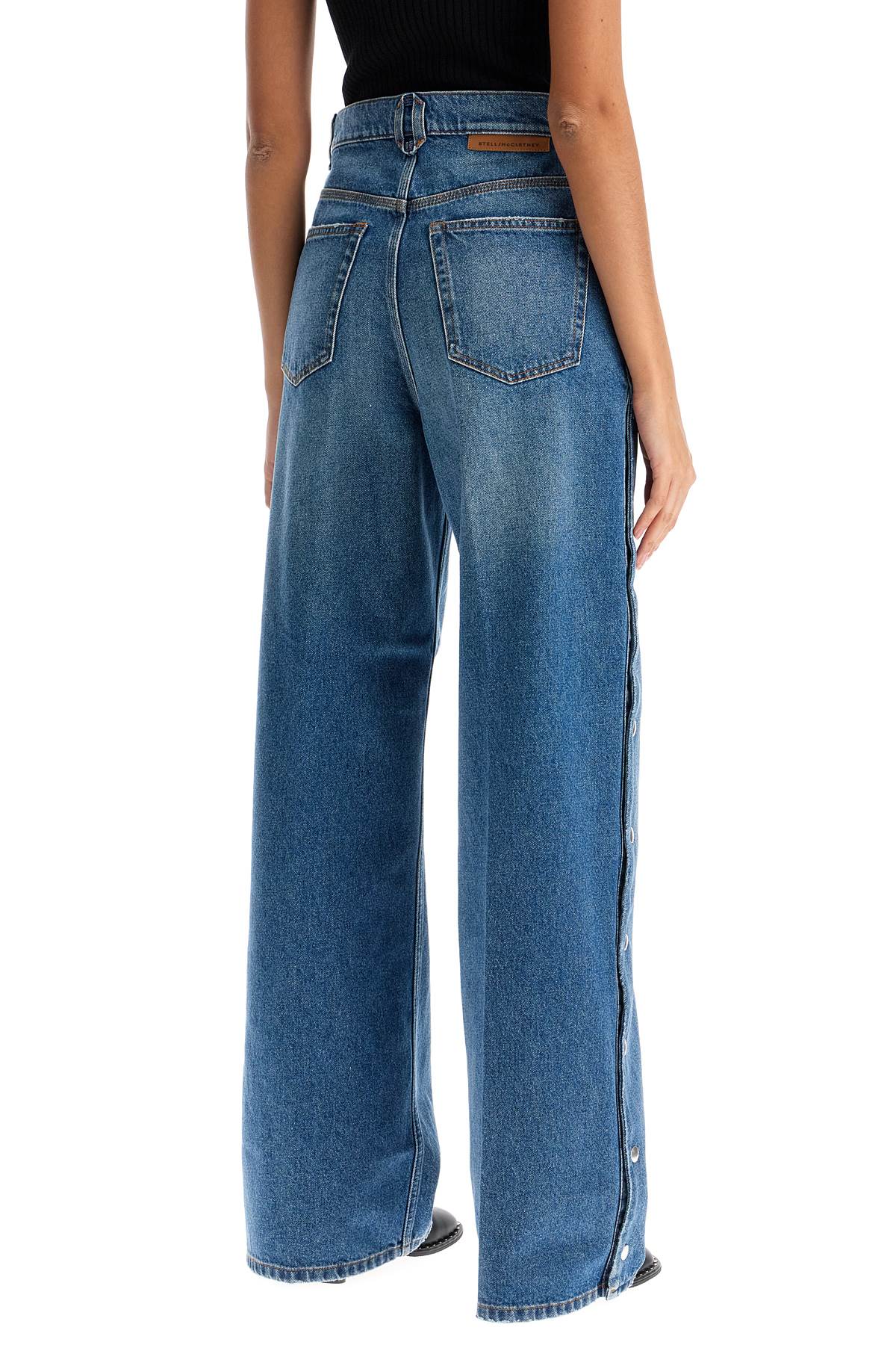 Shop Stella Mccartney Buttoned Ripped Jeans With Sl In Vintage Blue Denim (blue)