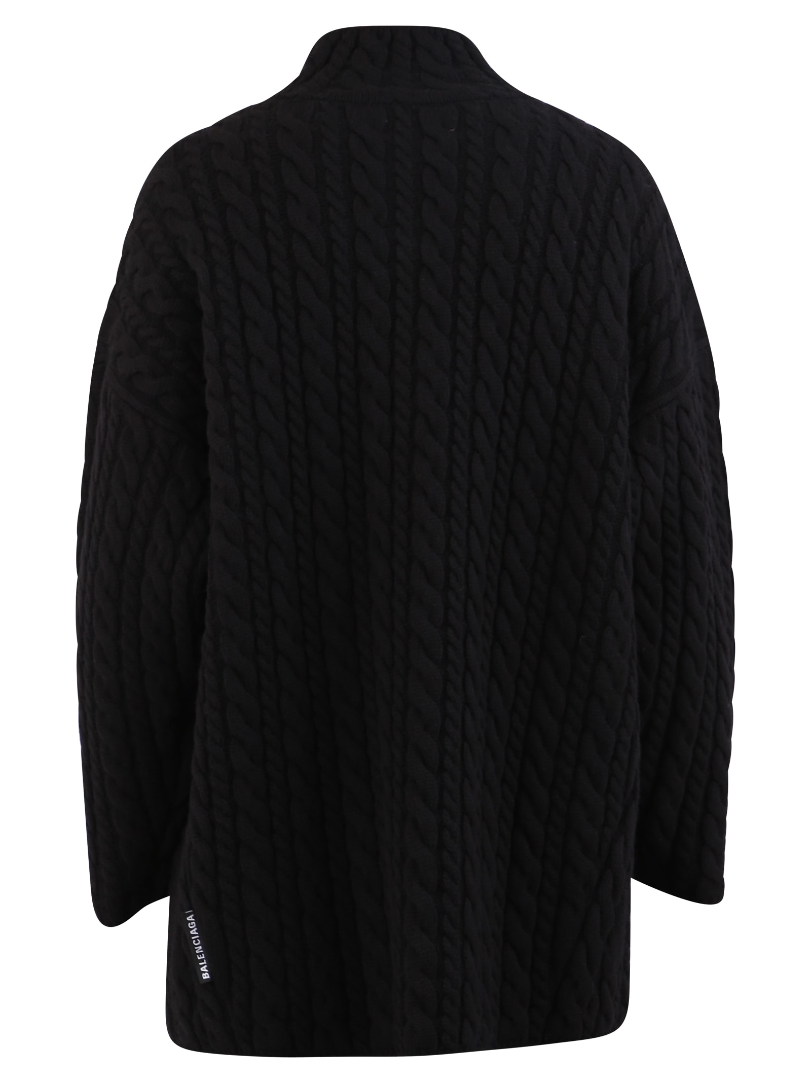 black cable knit sweater