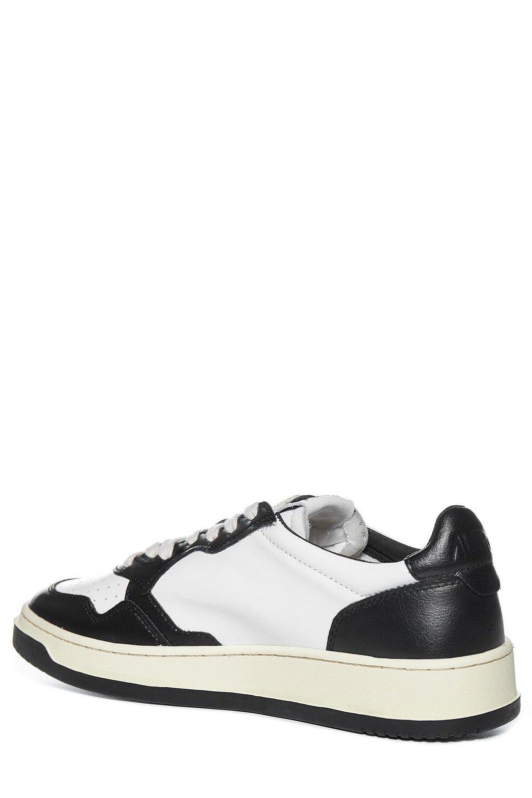 Shop Autry Two-tone Low-top Sneakers In Black