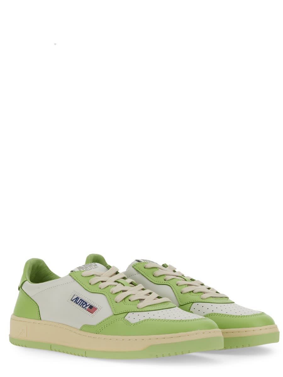 Shop Autry Medalist Low Sneaker In Wht/snap Grn