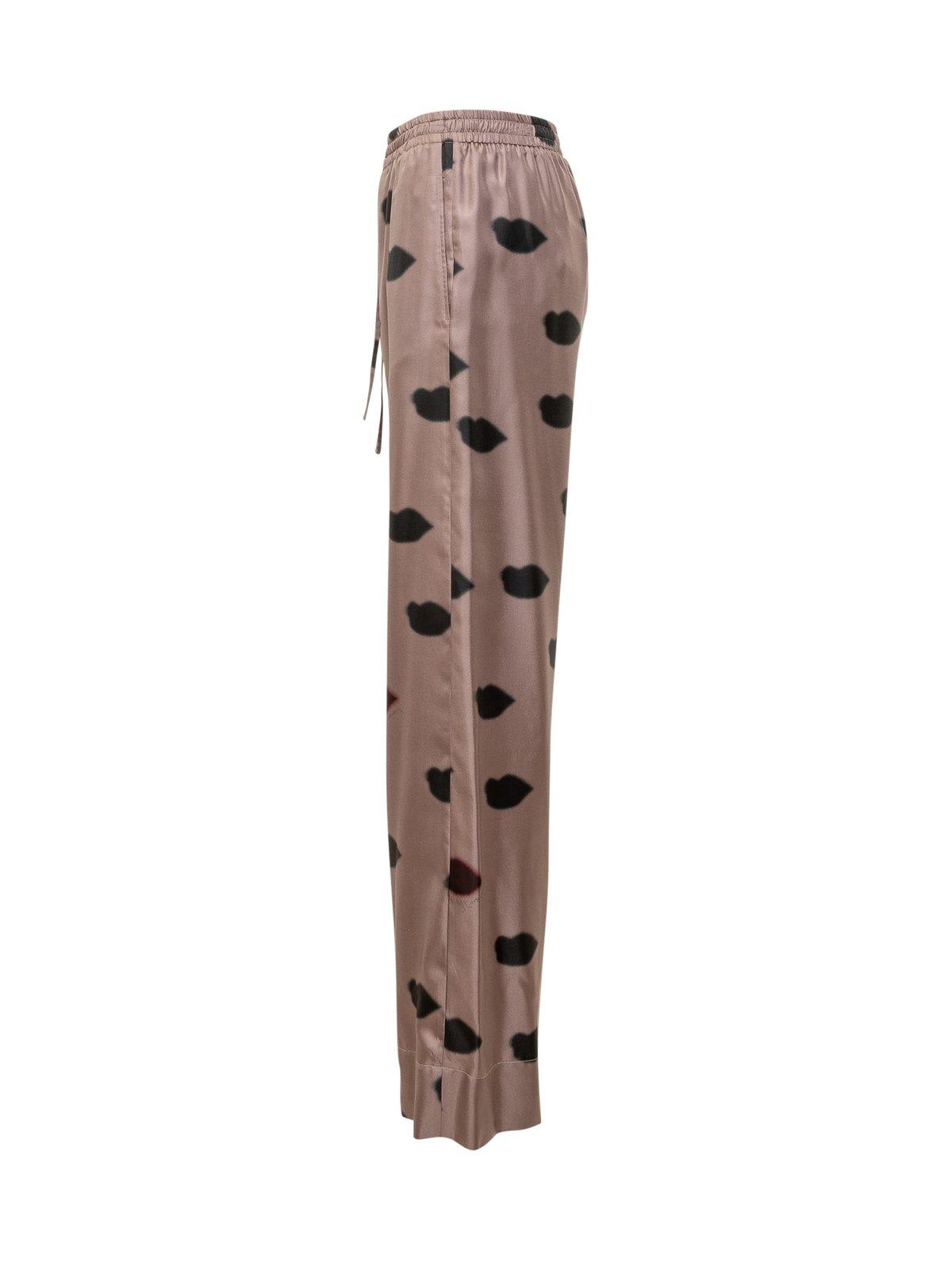 Shop Stella Mccartney Oversized Lips Printed Trousers In Light Taupe