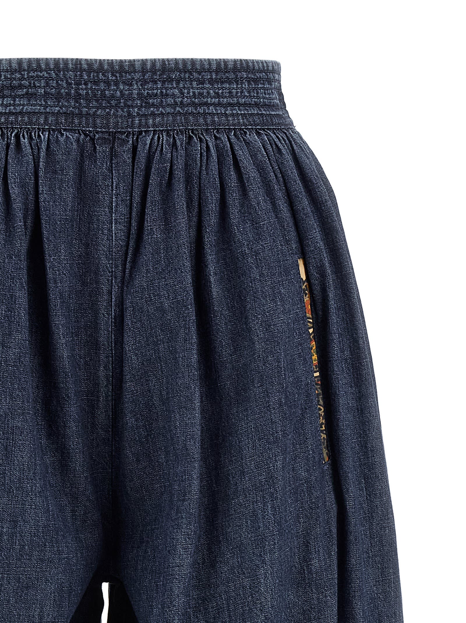 Valentino Tasseled Embroidered Chambray Tapered Pants In Blue