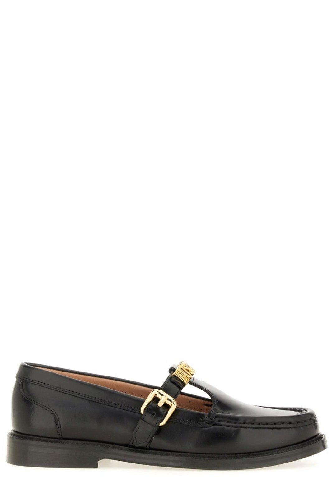 Shop Moschino Logo Lettering Slip-on Loafers In Black