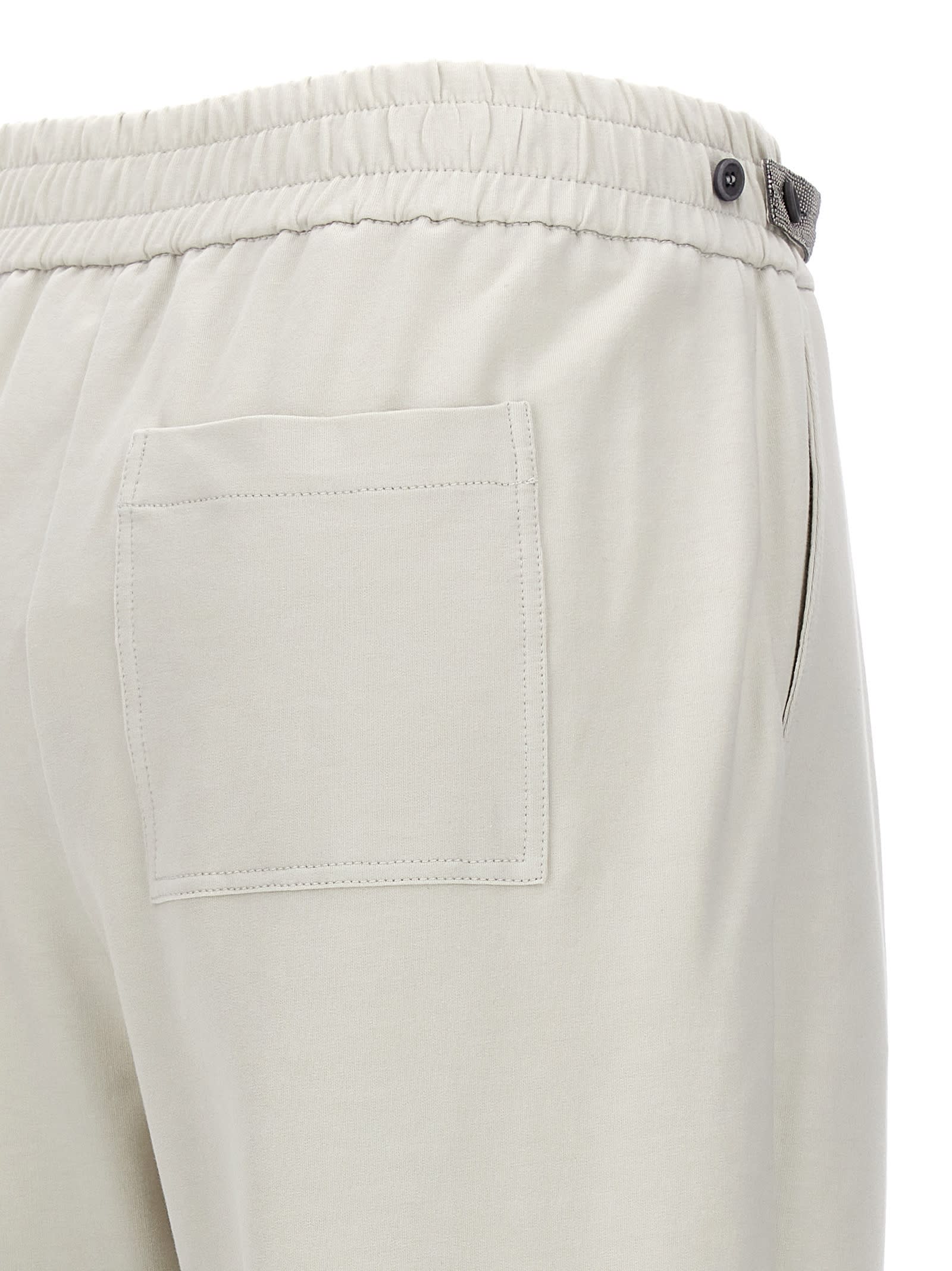 Shop Brunello Cucinelli Pants With Front Pleats In White
