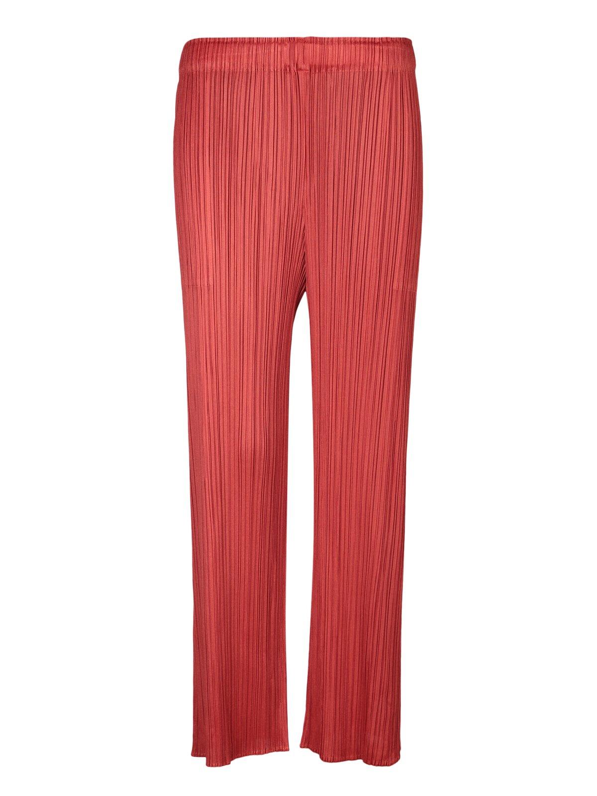 Shop Issey Miyake Pleated Straight Leg Pants In Red