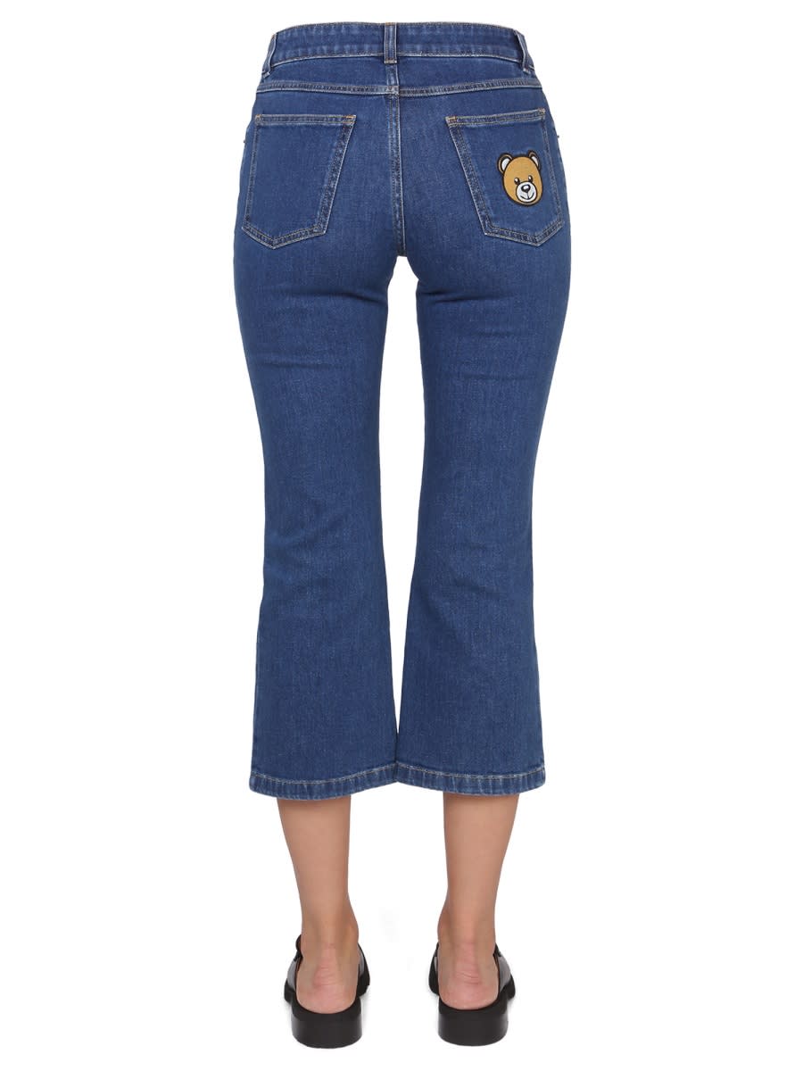 Shop Moschino Cropped Jeans In Blue