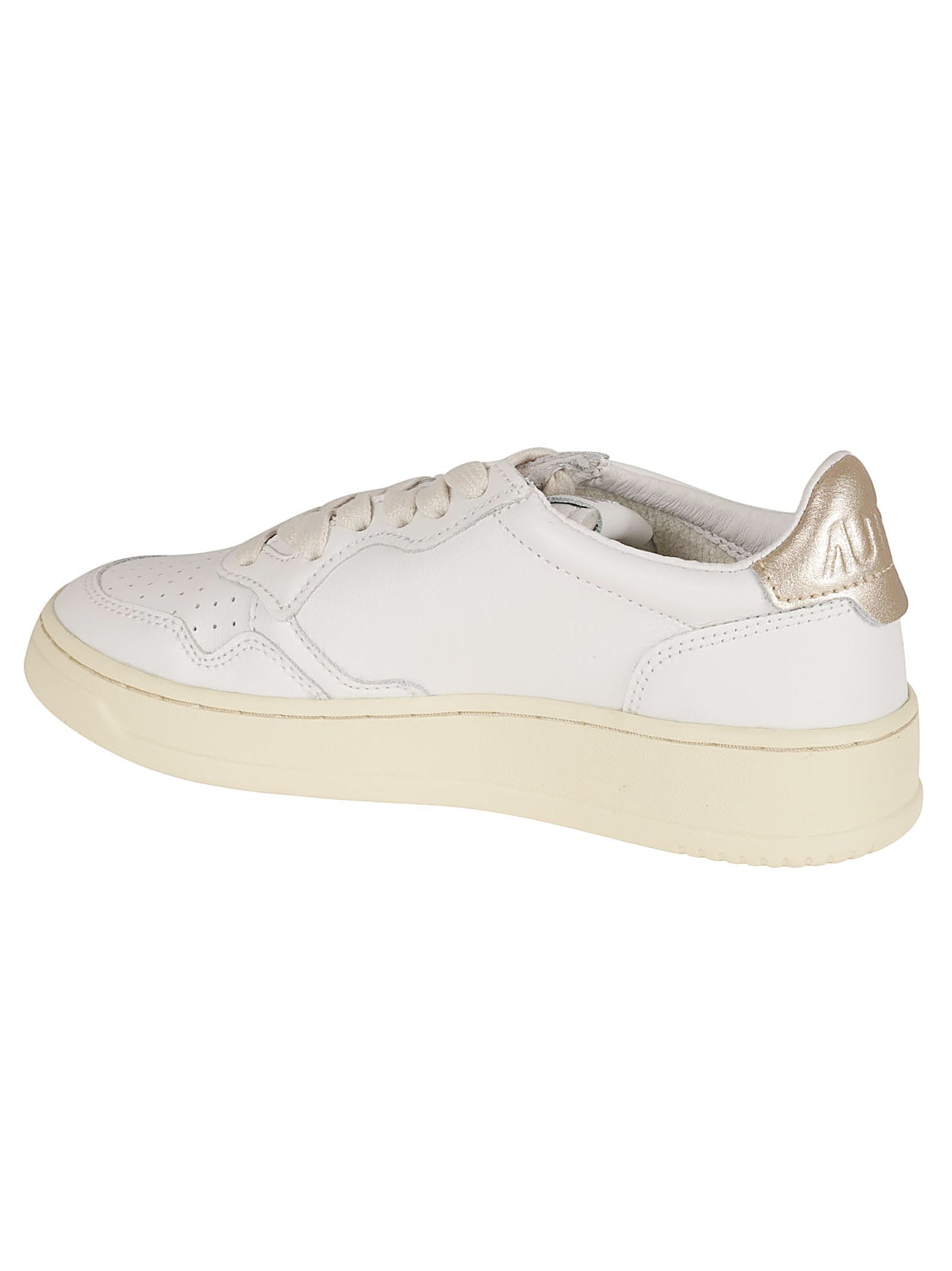 Shop Autry Low Woman Sneakers In White/gold